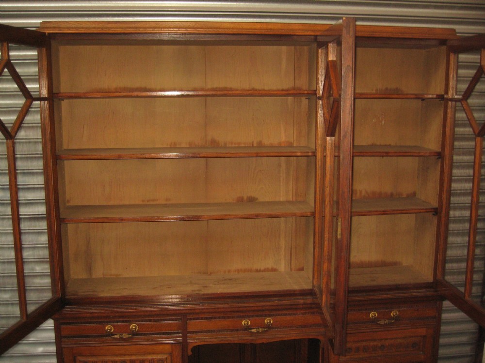 Oak three door bookcase View VI