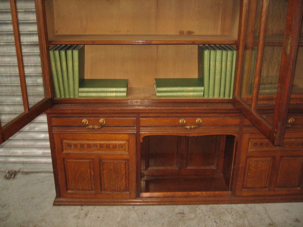 Oak three door bookcase View X