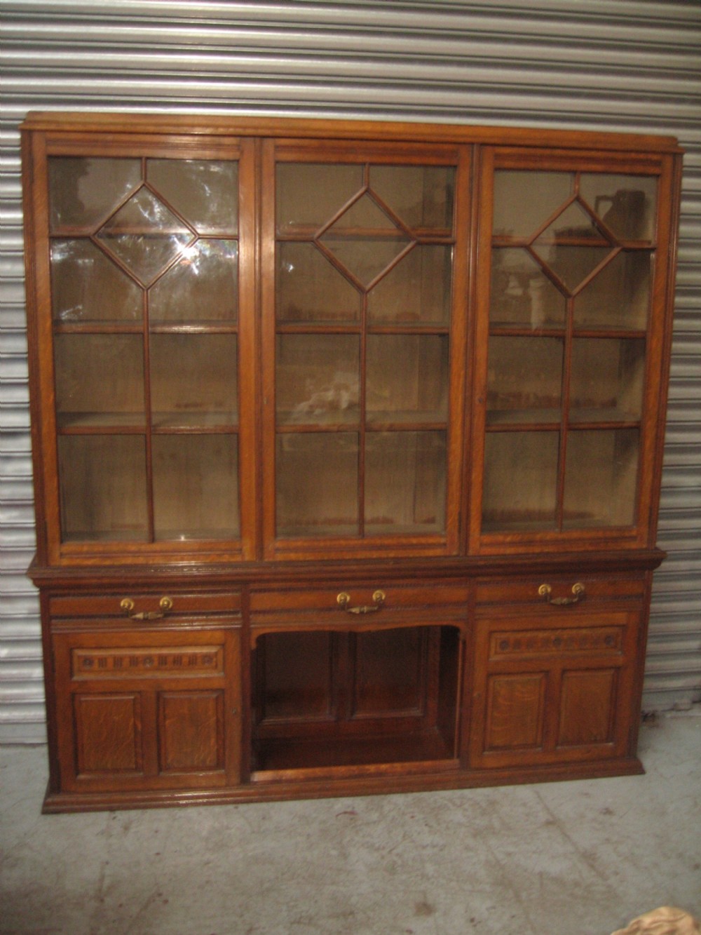 Oak three door bookcase View XI