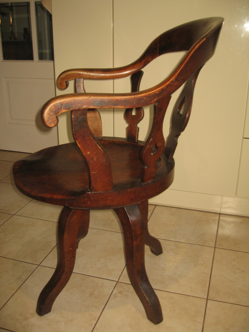 Late Victorian swivel office arm chair View IV