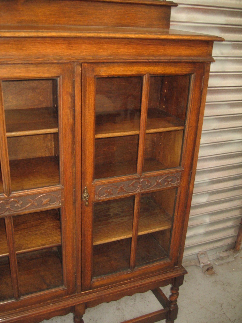 Oak three door  bookcase View III