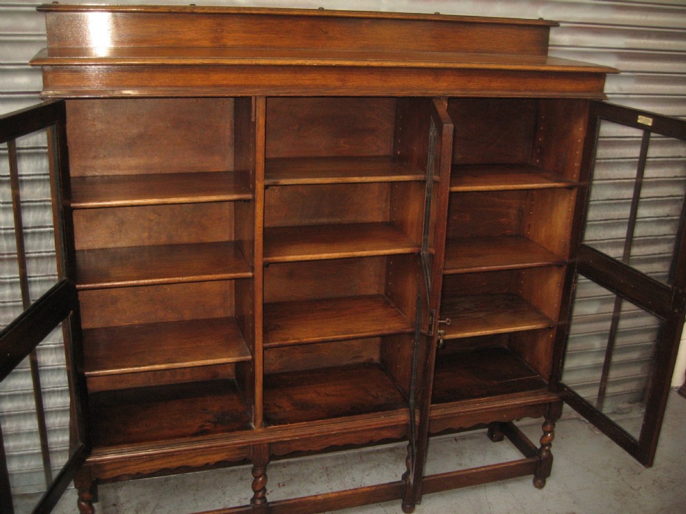 Oak three door  bookcase View VII