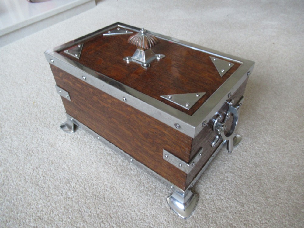 Oak and metal decorated lid box