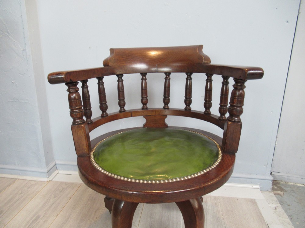Late victorian oak swivel desk arm chair View II