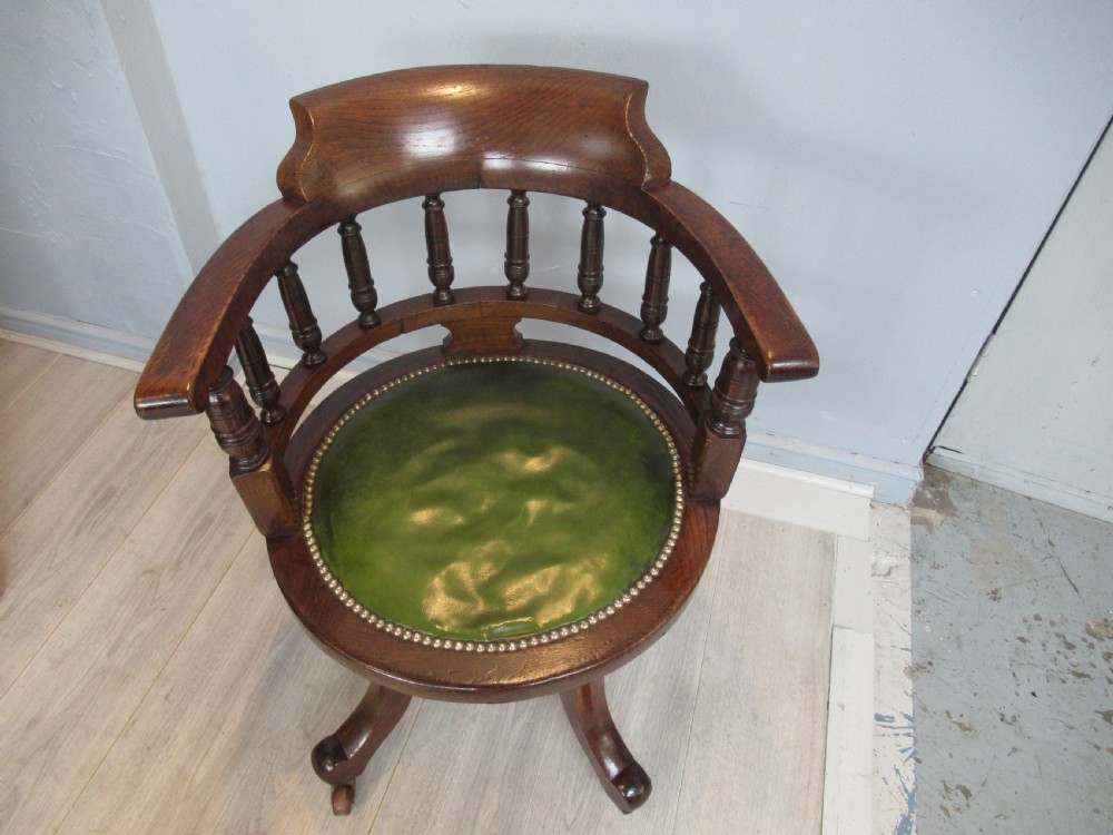 Late victorian oak swivel desk arm chair View V