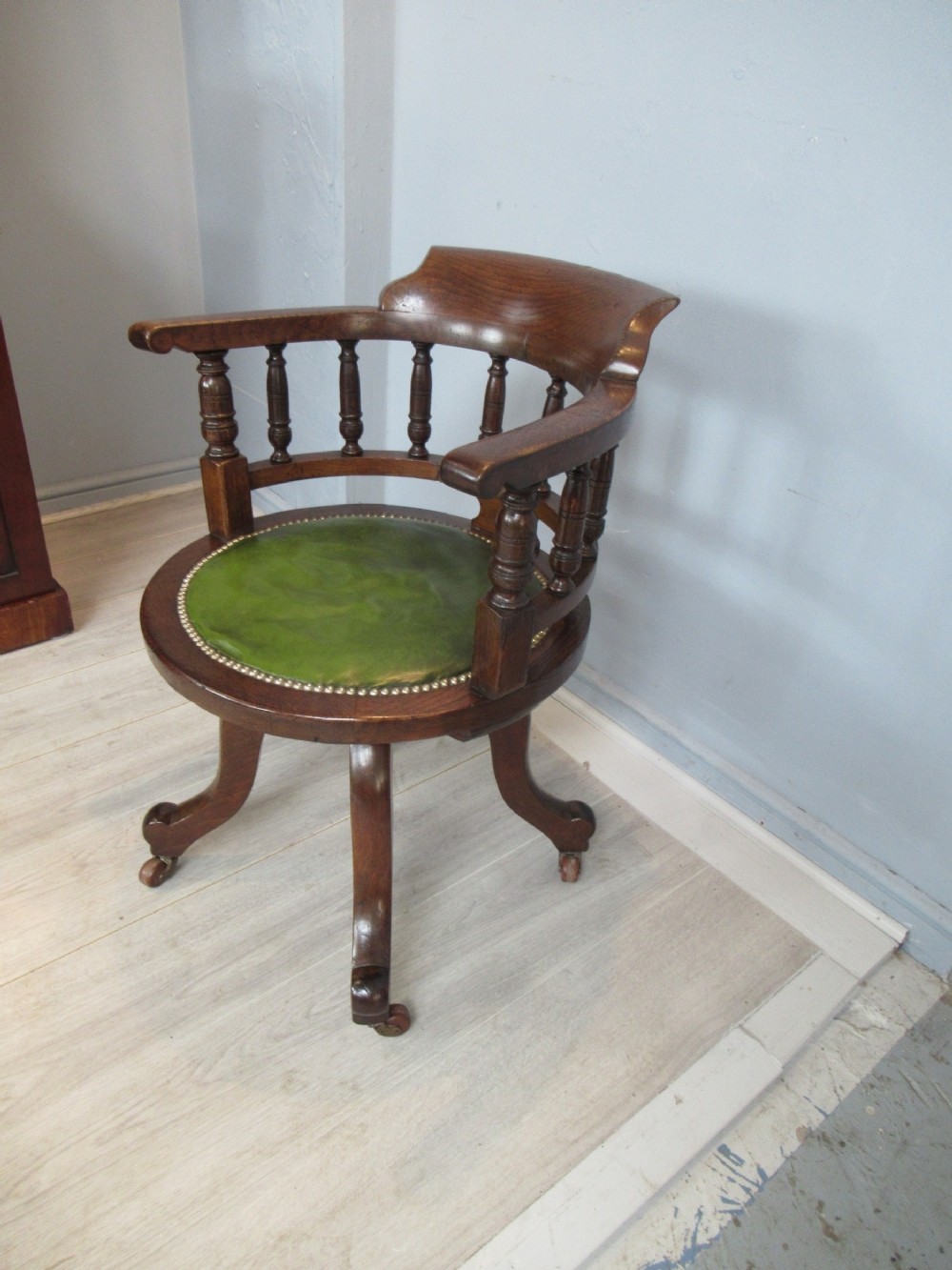 Late victorian oak swivel desk arm chair