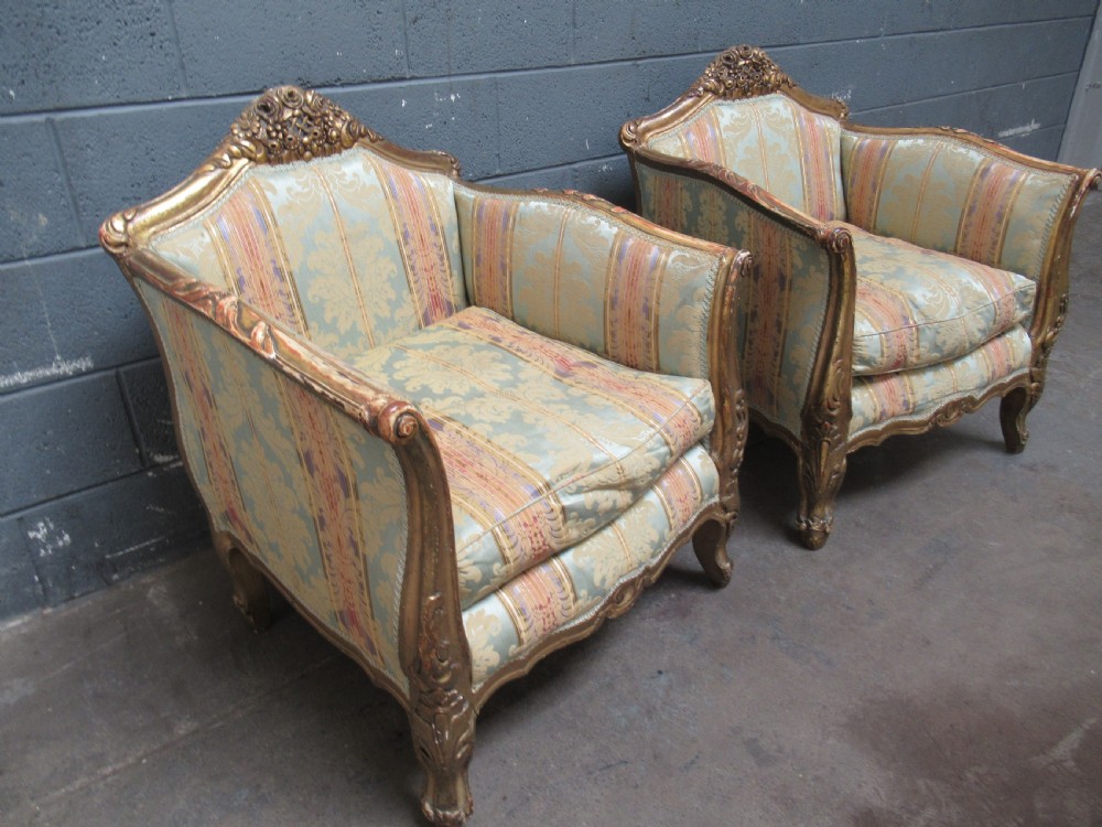 Deep pair of French gilt arm chairs