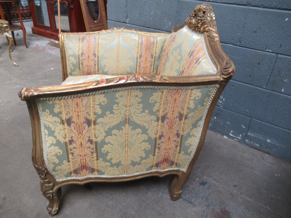 Deep pair of French gilt arm chairs View V