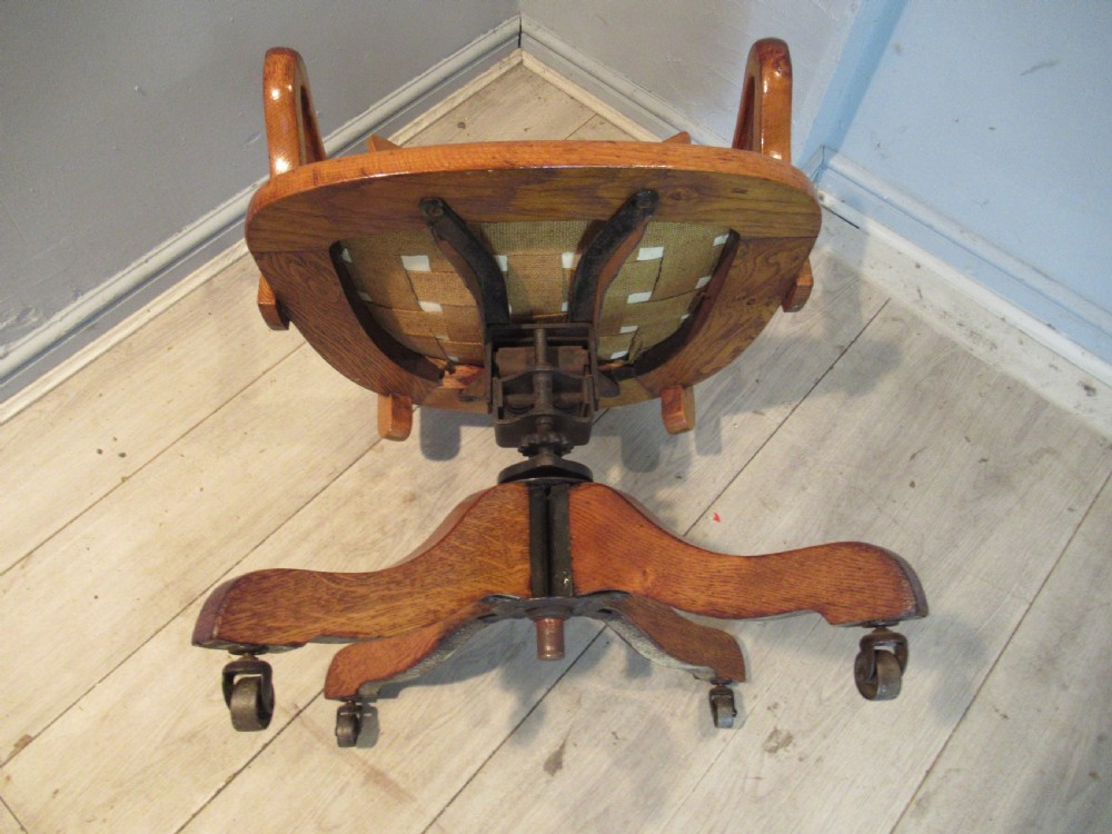 Oak swivel office arm chair View VII