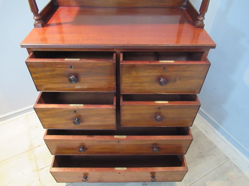 Unusual mahogany chest of drawers by Edwards & Roberts  London. View VI