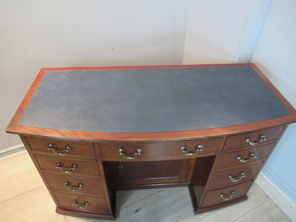 Mahogany bow front desk  View II