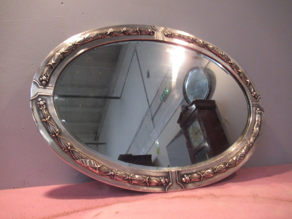 Oval art deco period  polished framed  wall mirror View II
