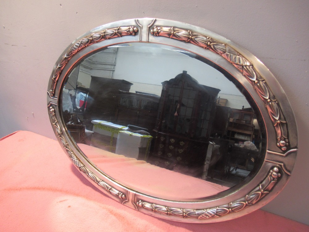 Oval art deco period  polished framed  wall mirror View IV