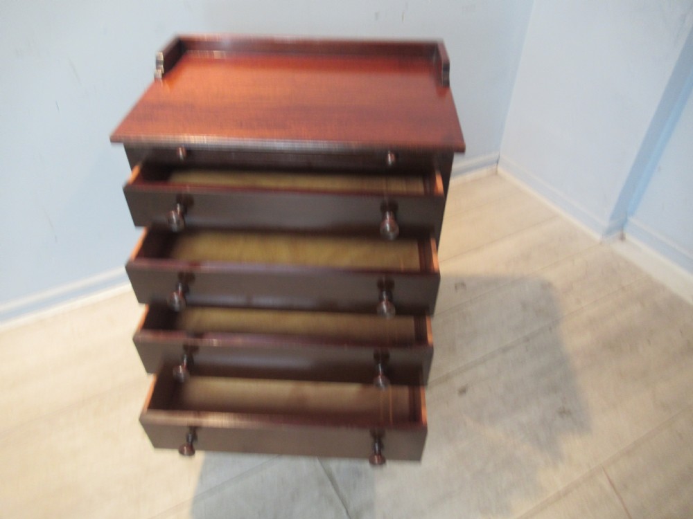 Small size mahogany chest of drawers with slide out shelf View II