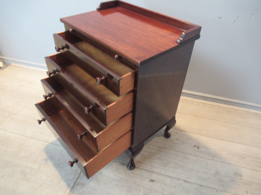 Small size mahogany chest of drawers with slide out shelf View III