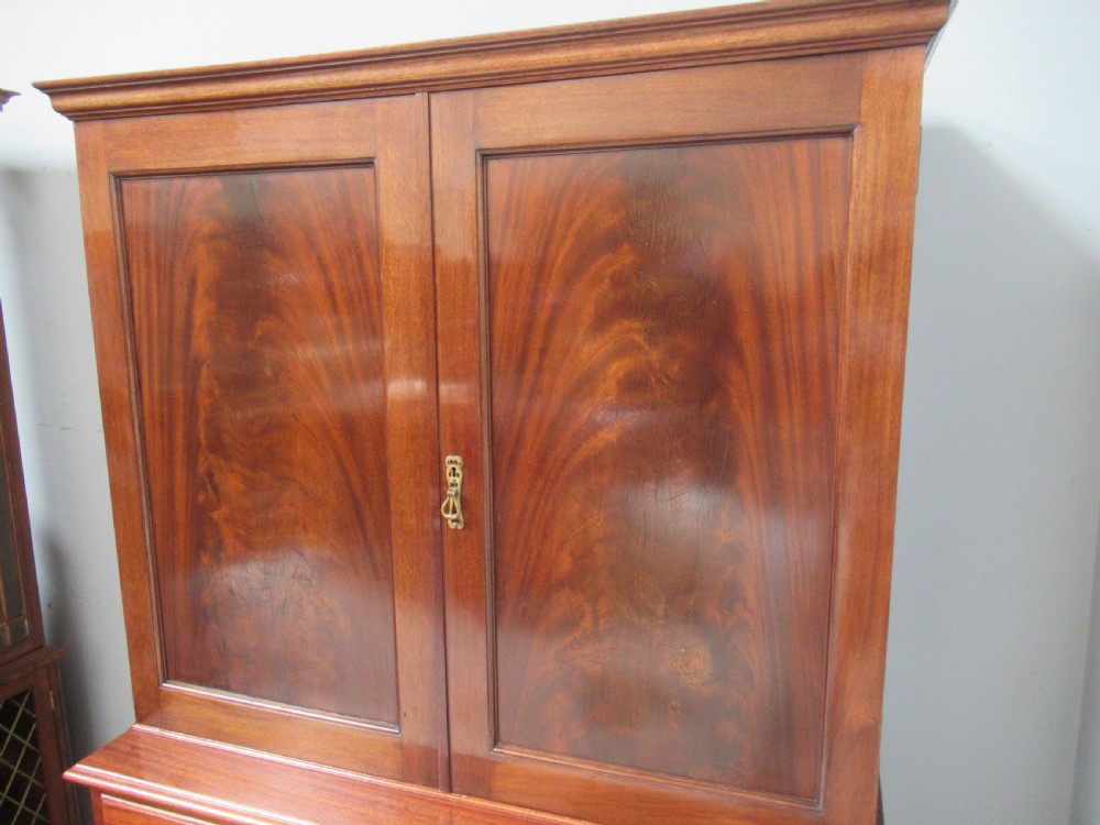  Mahogany cupboard on chest  View II