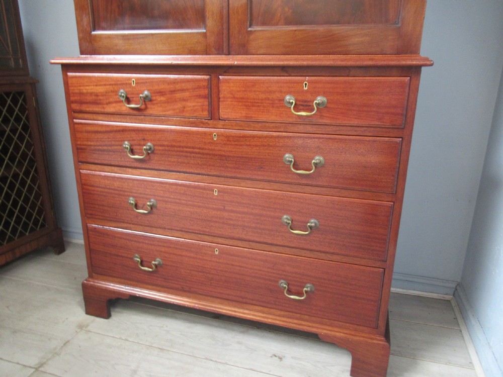  Mahogany cupboard on chest  View III