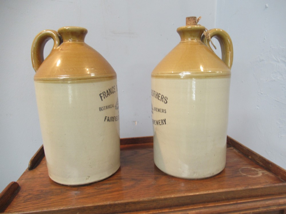 Pair of early 20th century earthenware Ale  jugs View II