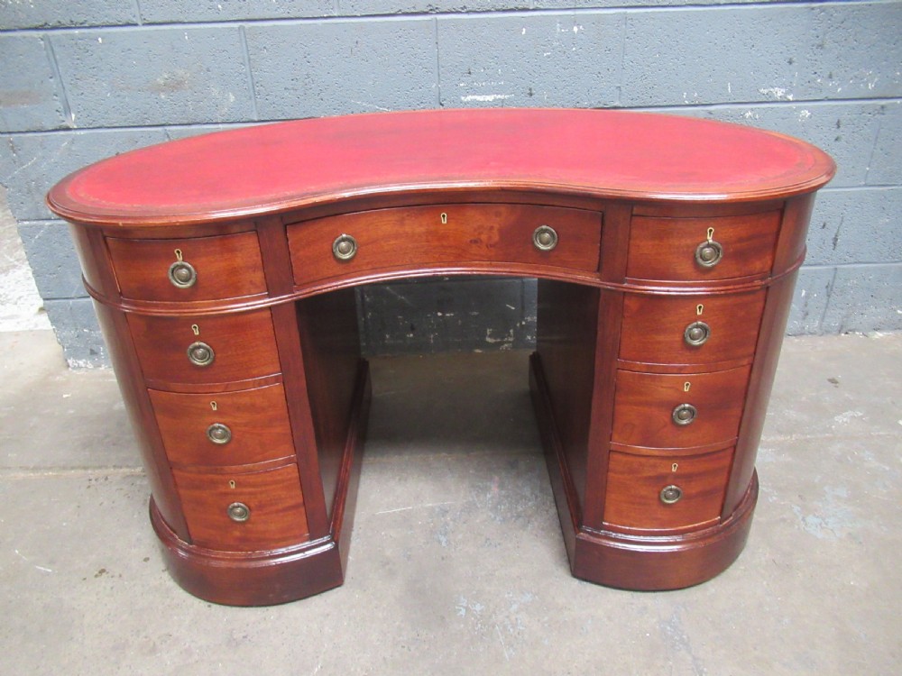 Edwardian mahogany kidney shaped knee hole desk