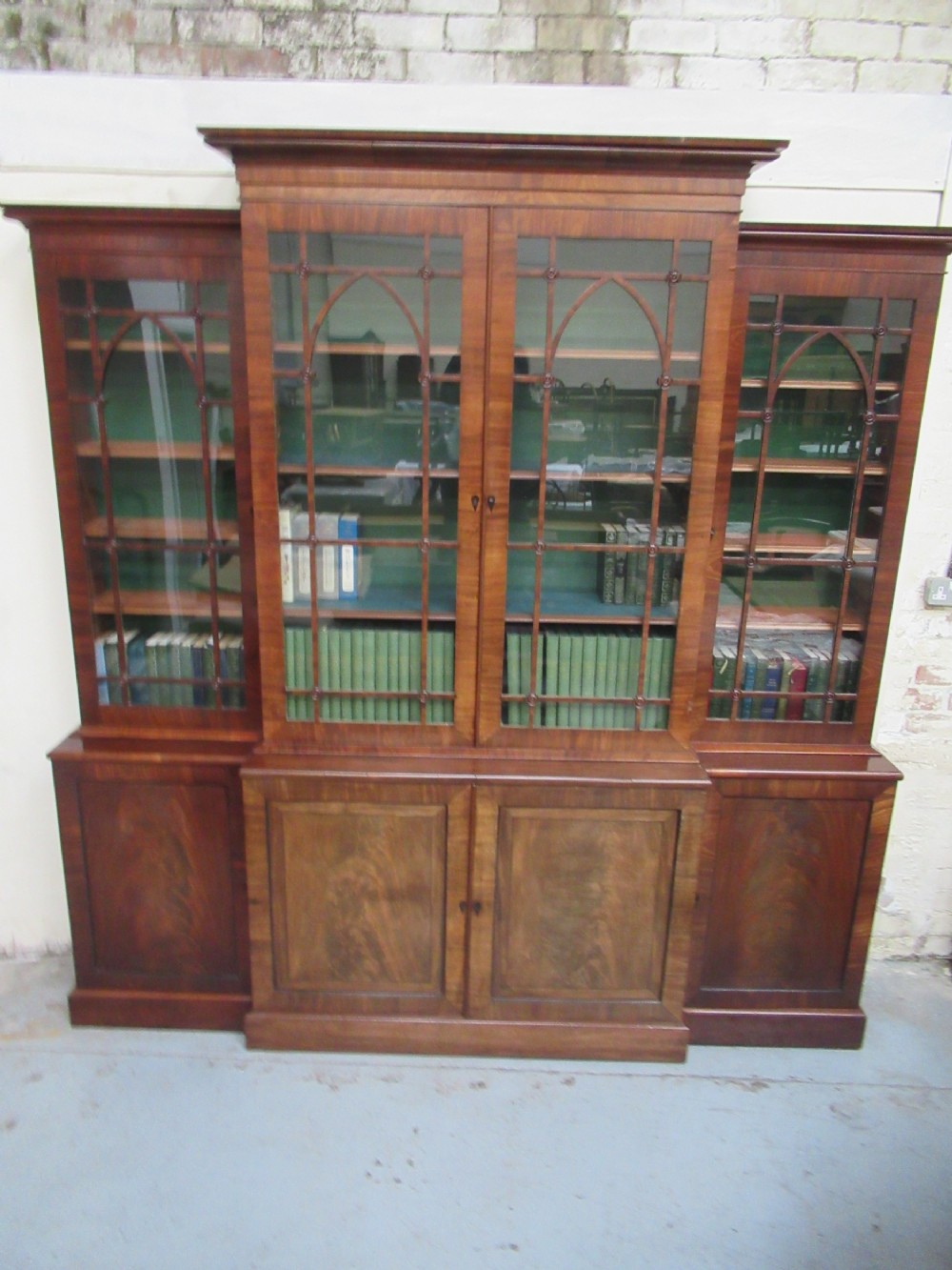 Regency period  mahogany break front  bookcase