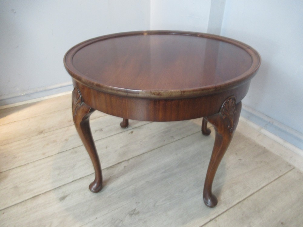 Round mahogany coffee table by Waring and Gillows View II