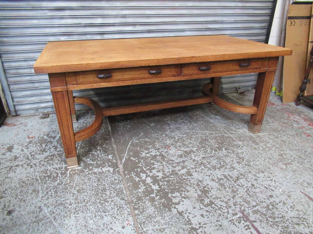 Large oak table by Globe  Wernike  Co.   LONDON