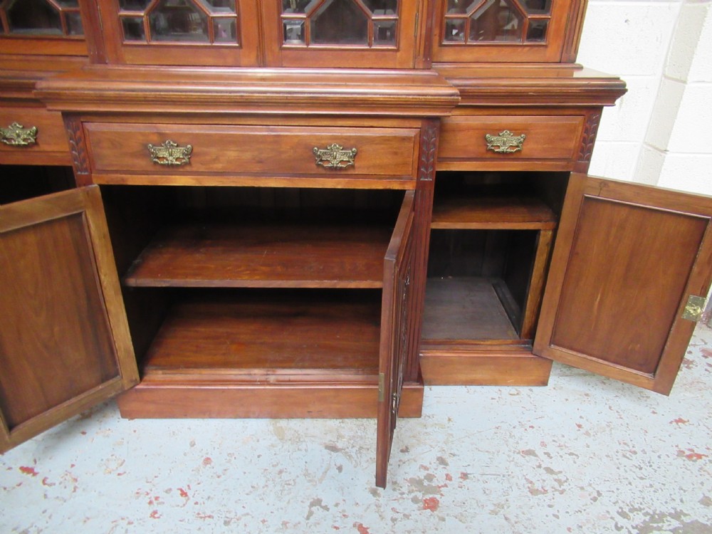 Late Victorian walnut break front bookcase View XI