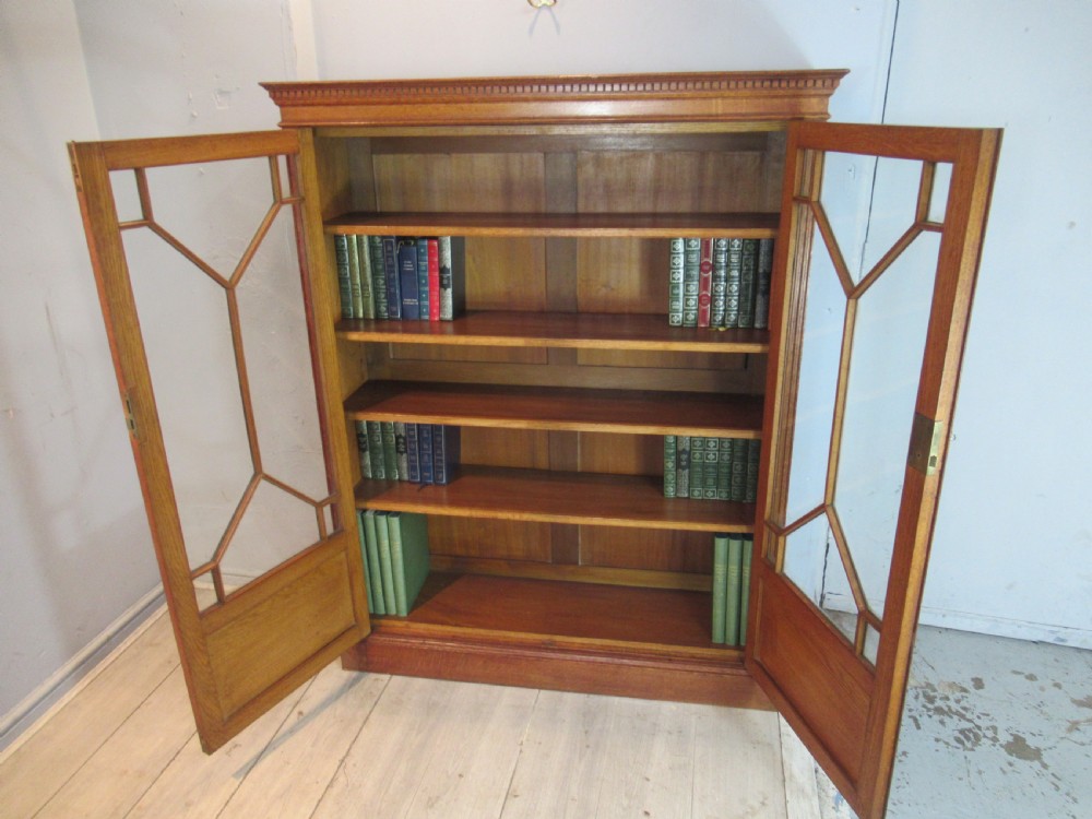 Edwardian   Oak two glass door bookcase