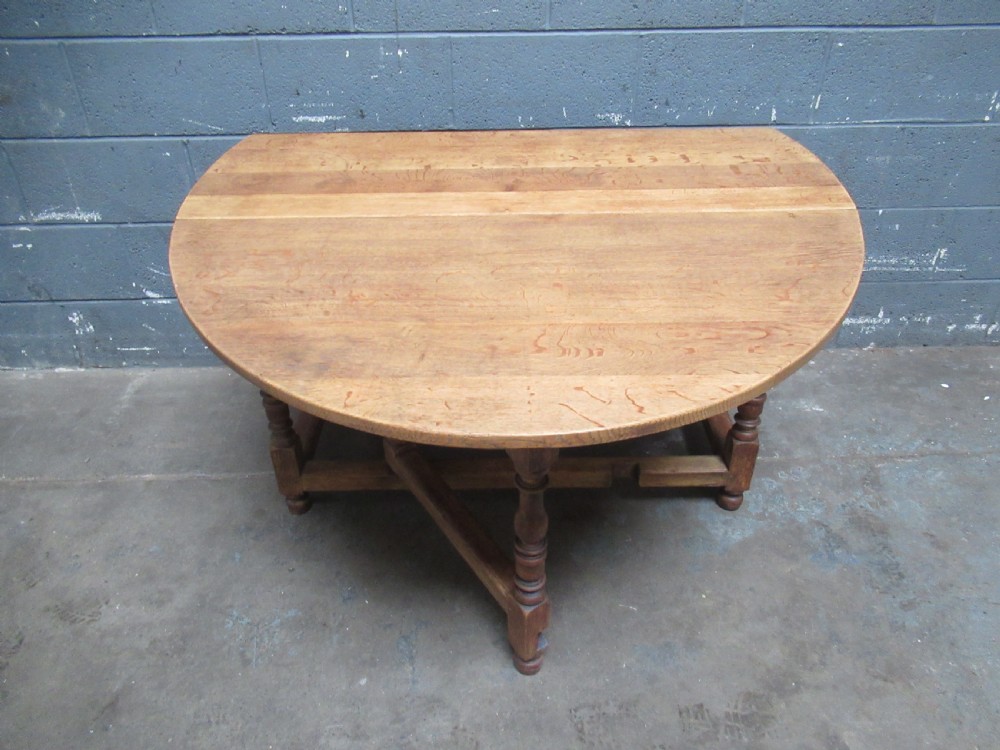 Light oak drop leaf six seat dining table View III