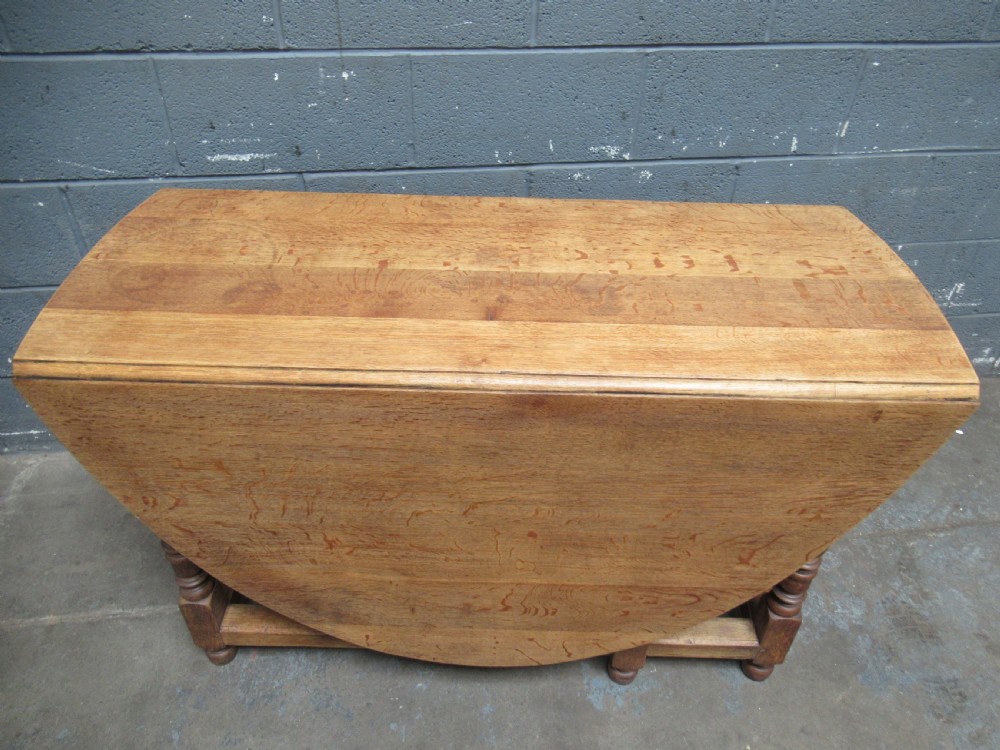 Light oak drop leaf six seat dining table View IV