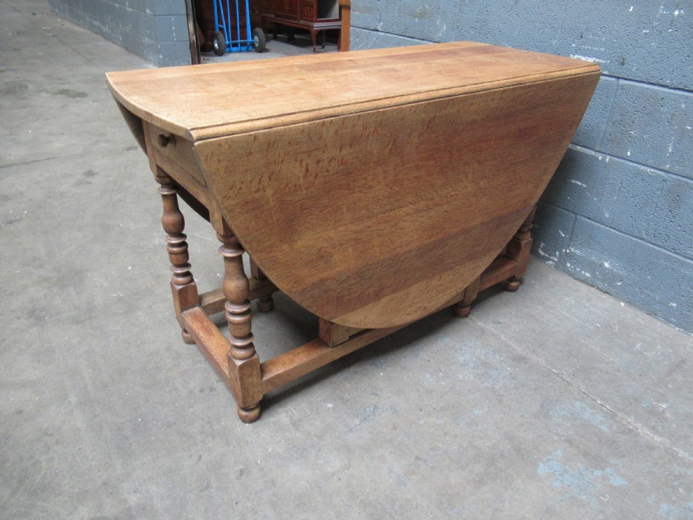 Light oak drop leaf six seat dining table View V