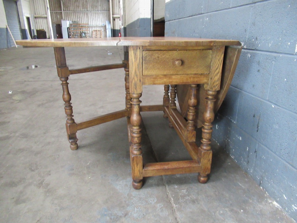 Light oak drop leaf six seat dining table View VII