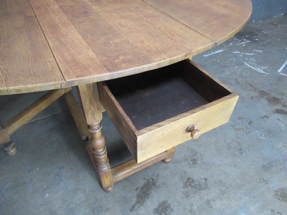 Light oak drop leaf six seat dining table View XI