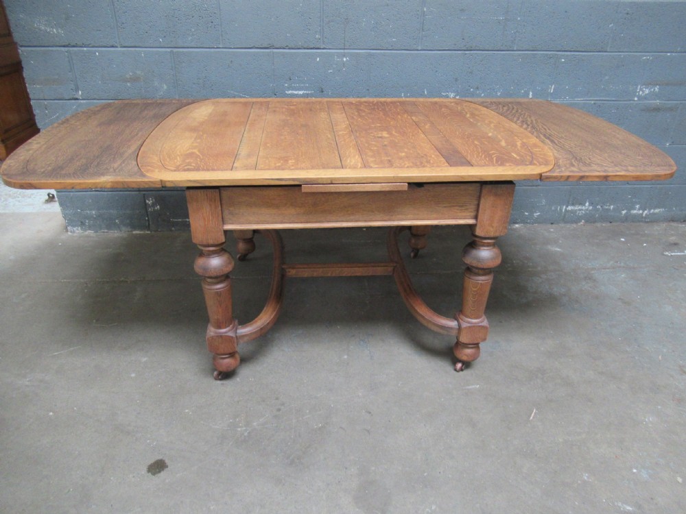 Oak Extending   dining table to seat six View IV
