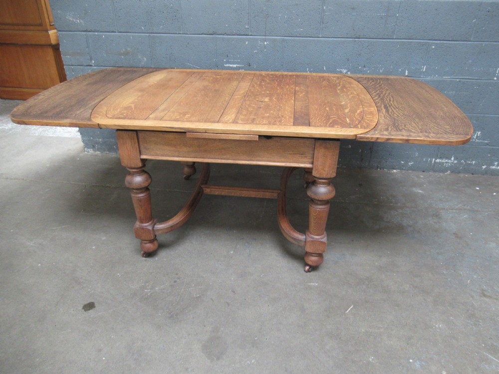 Oak Extending   dining table to seat six View VII