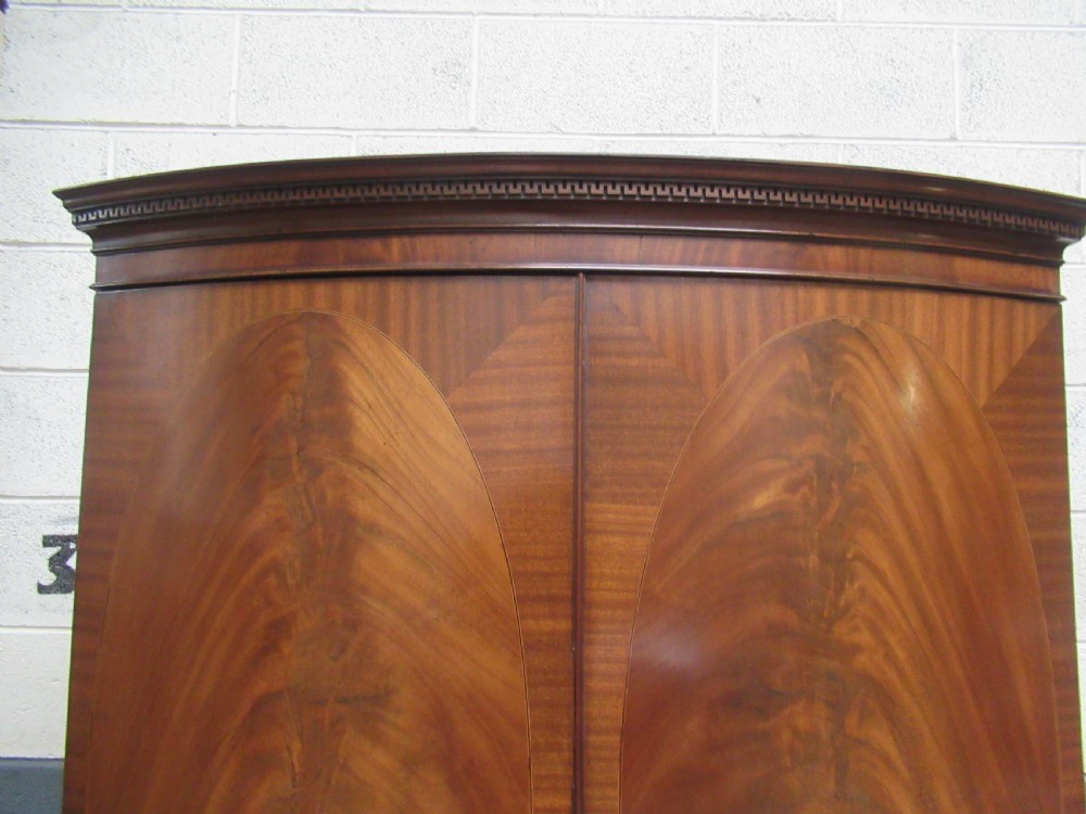 Mahogany  bow front wardrobe in the antique style. View V