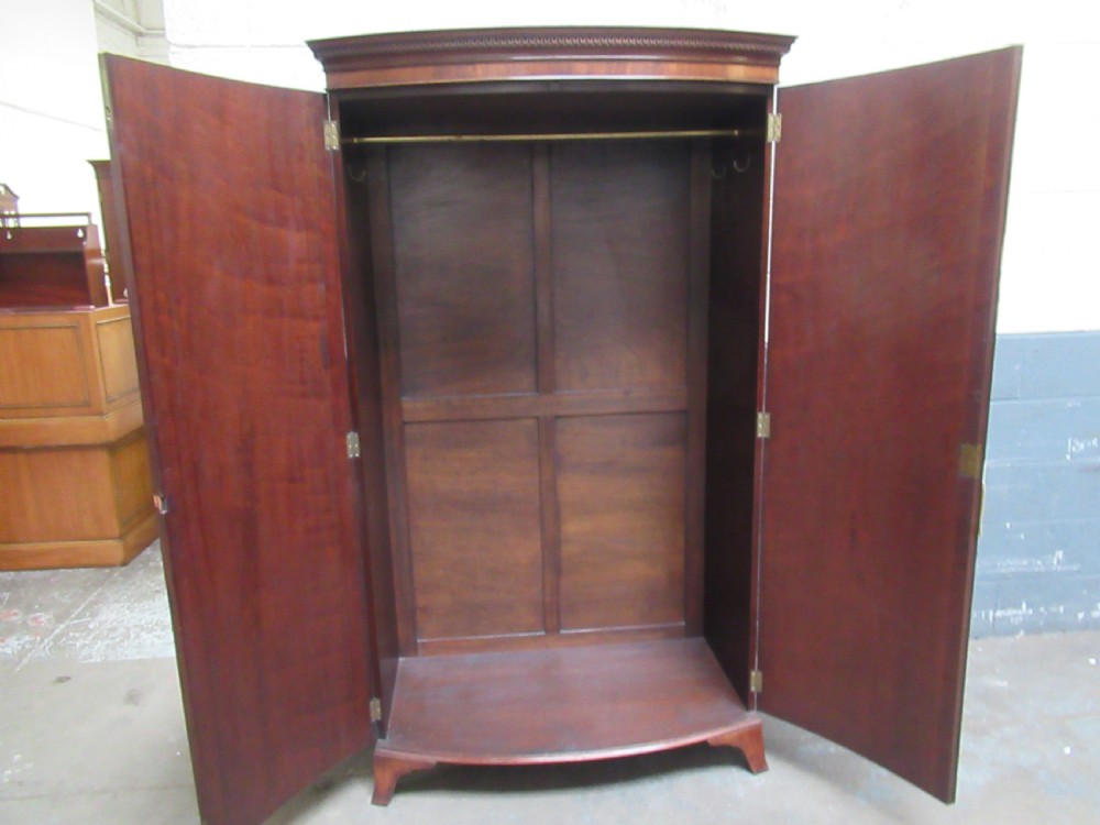Mahogany  bow front wardrobe in the antique style. View IX