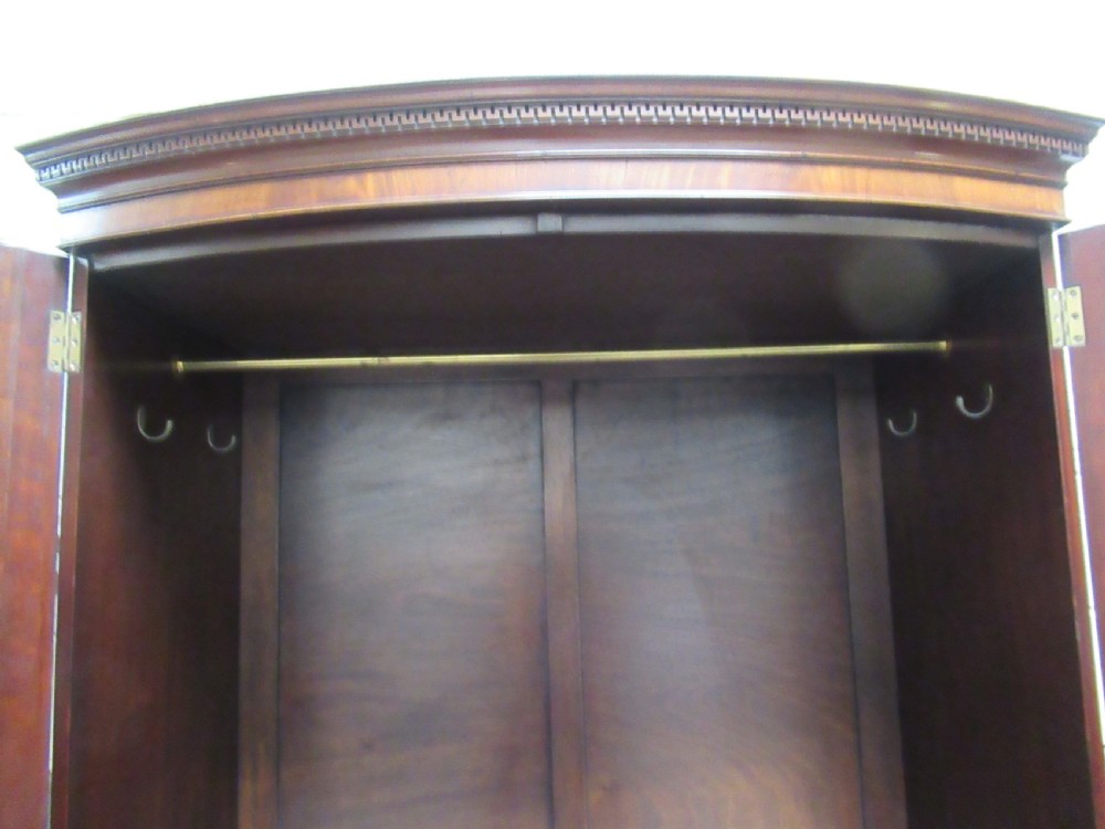 Mahogany  bow front wardrobe in the antique style. View X