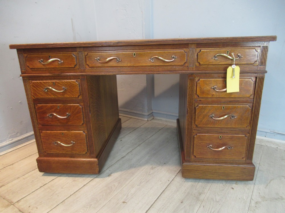 Edwardian period oak knee hole desk by Maple &co London View III