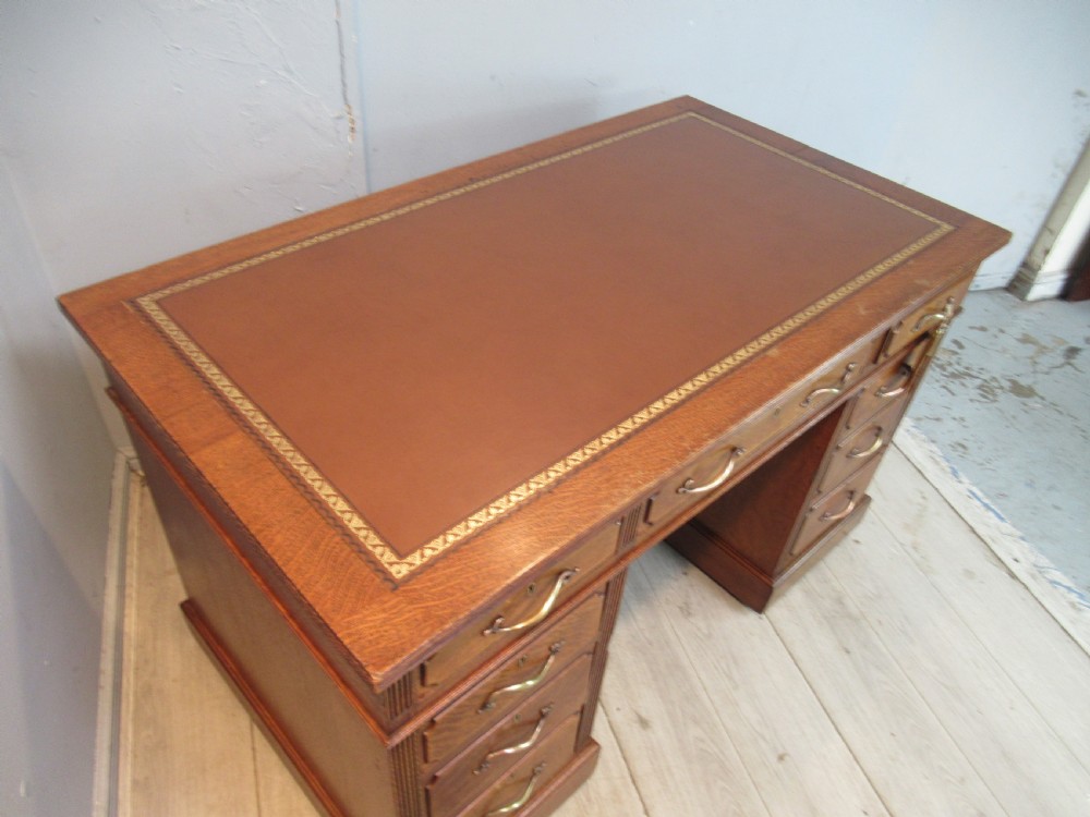 Edwardian period oak knee hole desk by Maple &co London View XV