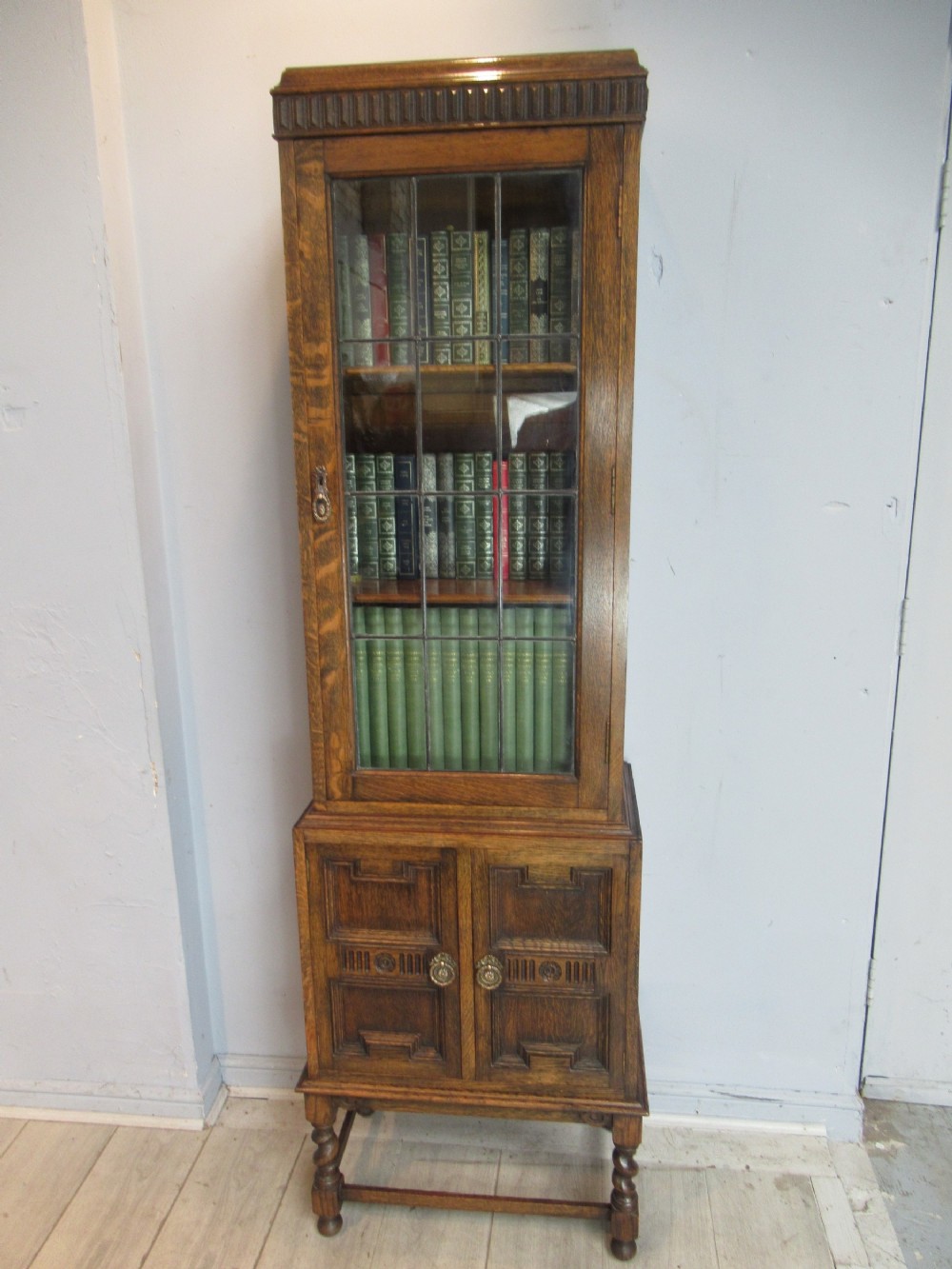 Tall slim size oak  bookcase 