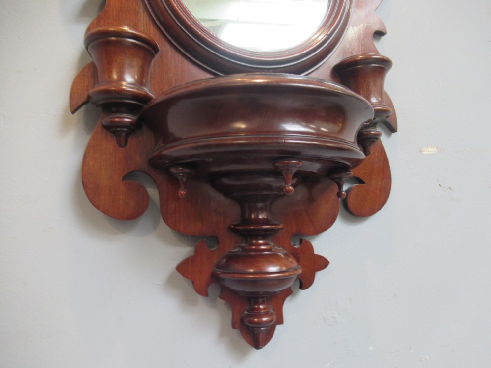 Small Victorian mahogany  shaped wall  mirror View IV