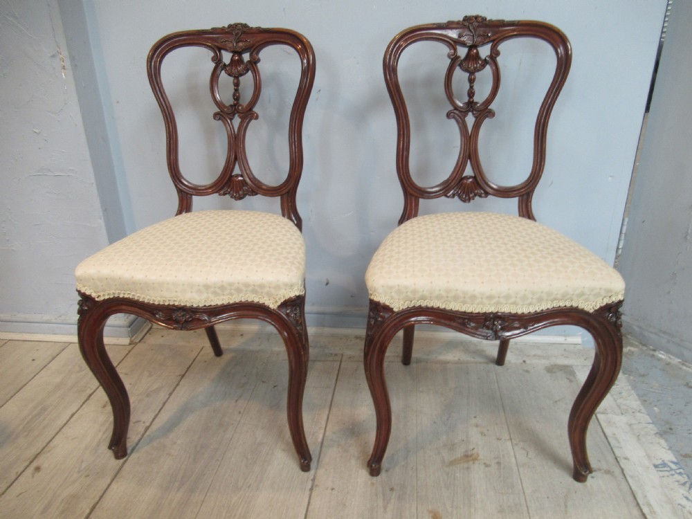 Pair of decorative  walnut Victorian side chairs