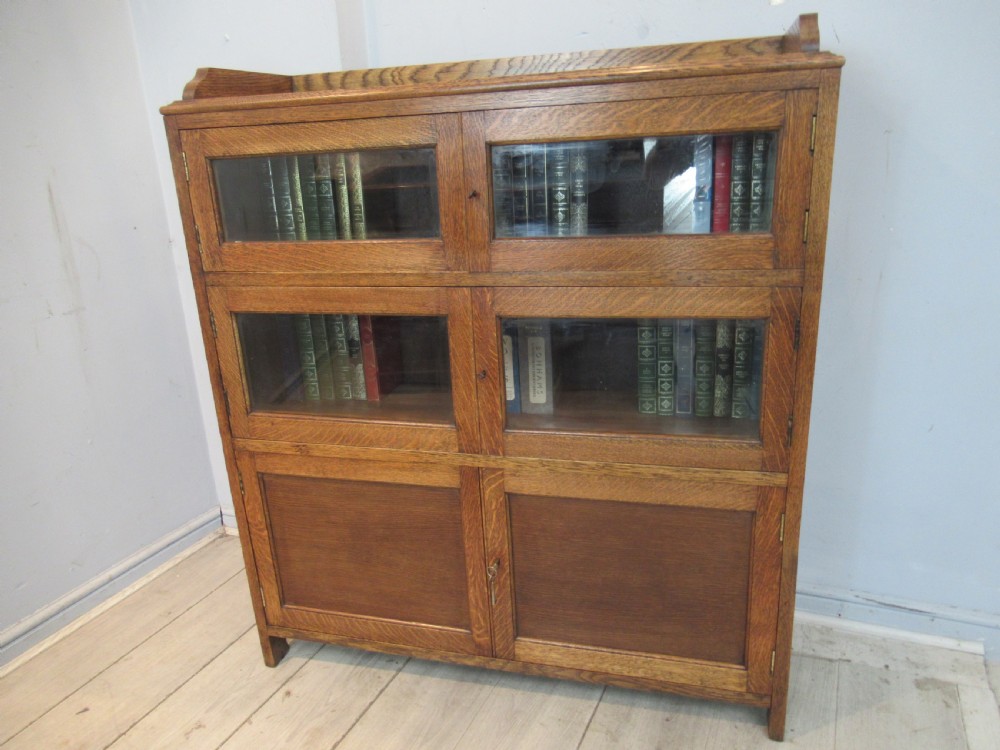 Oak  four glass and two panel doors bookcase