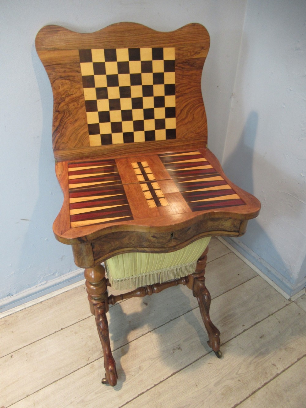 Victorian burr walnut   games / sewing table