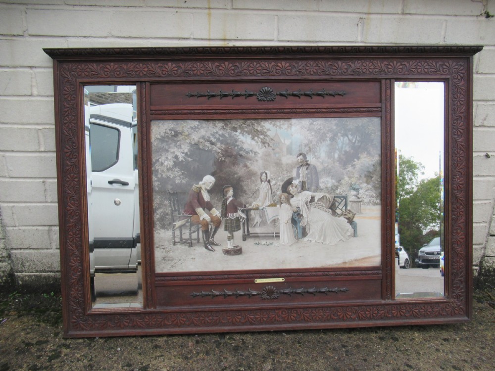 Decorative oak framed over mantle or wall mirror.