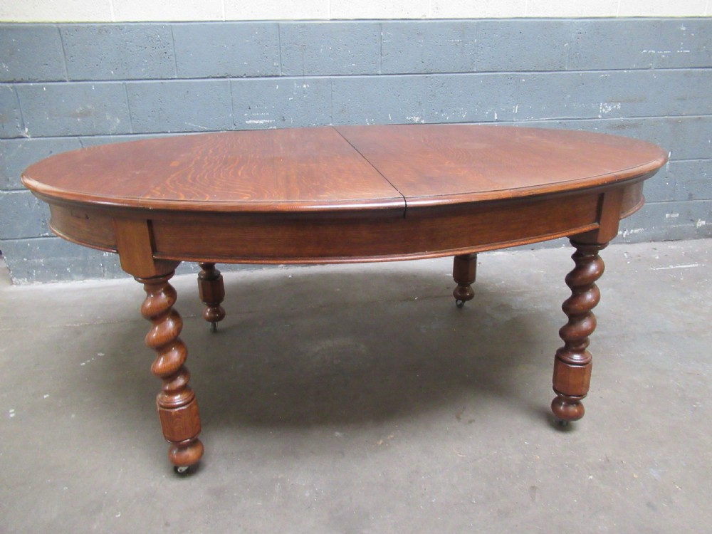 Oval oak extending dining table and set of six  dining chairs View VI