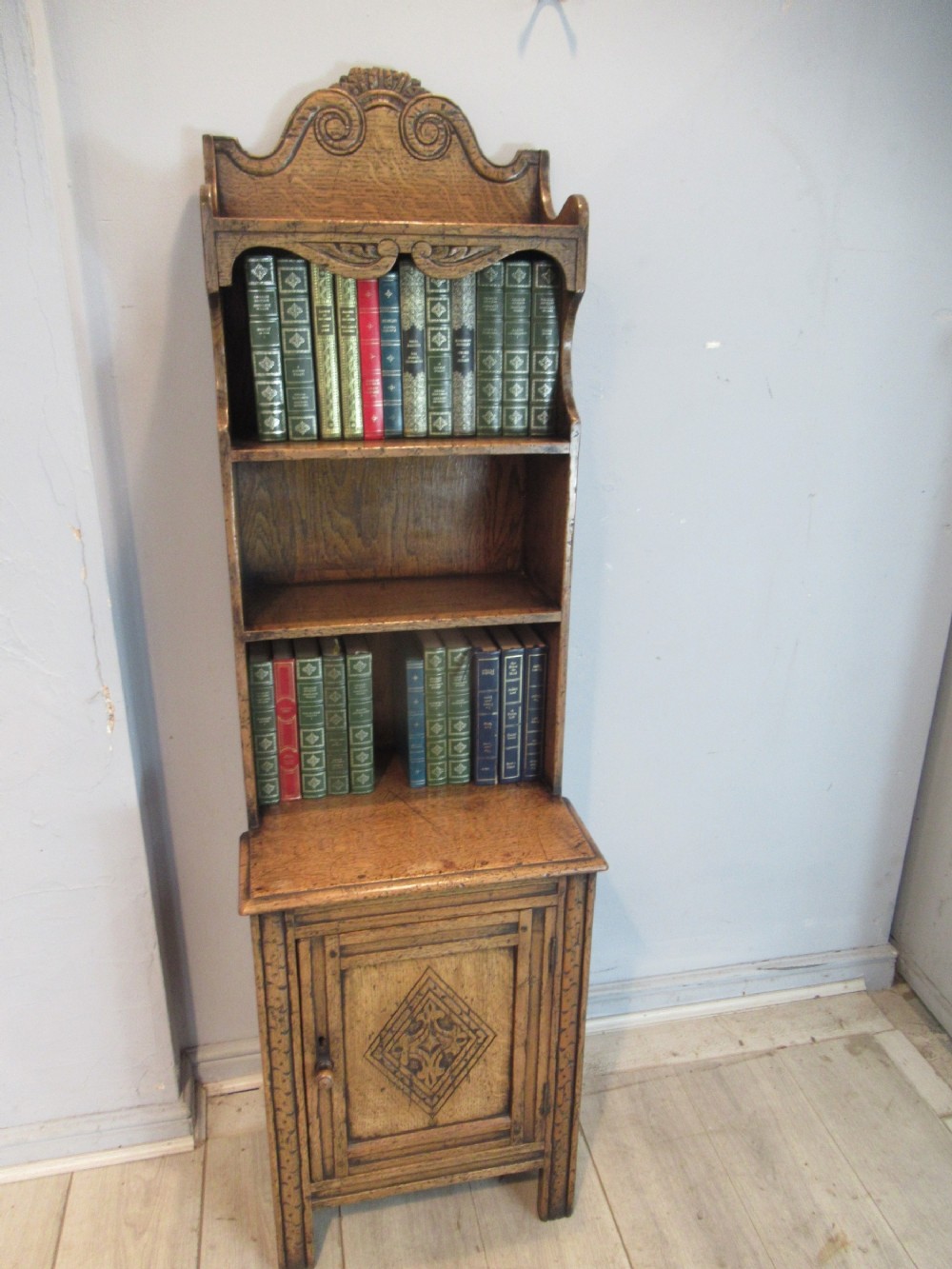 Slim size light oak open bookcase in the antique style 