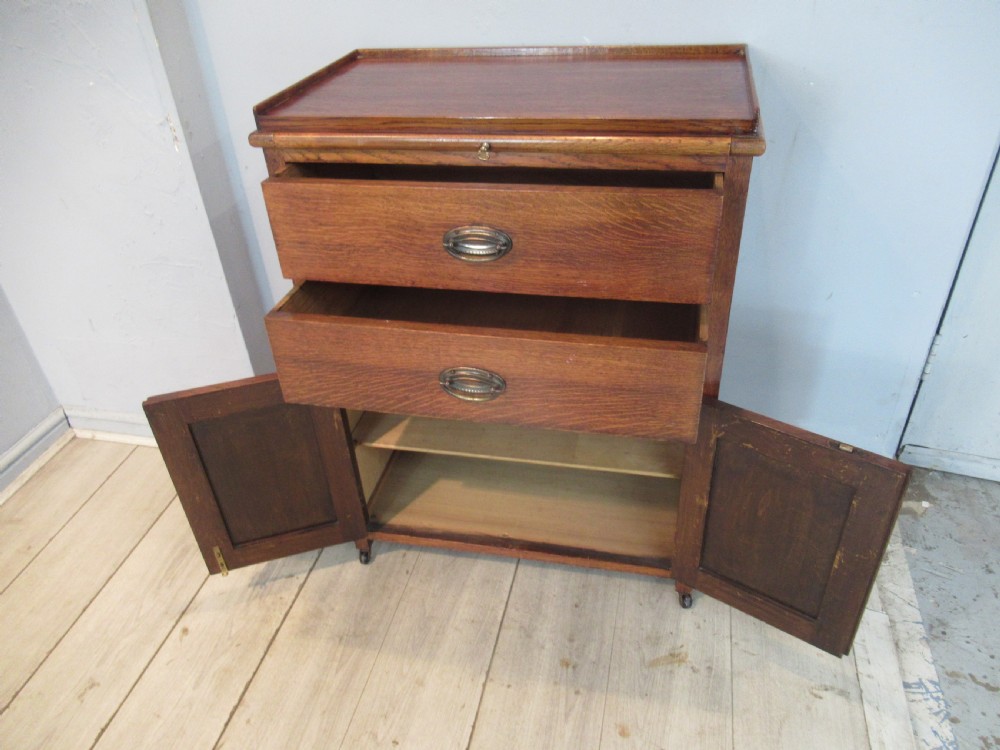 Oak 1920s  side cabinet  with slide shelf View VI