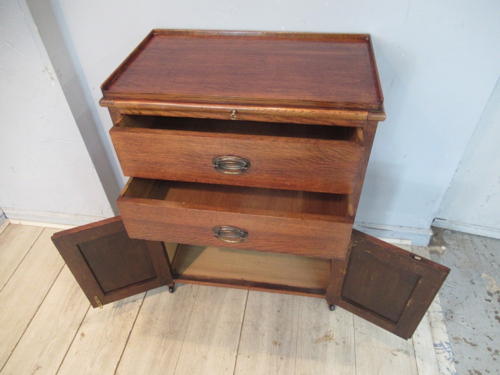 Oak 1920s  side cabinet  with slide shelf View VII